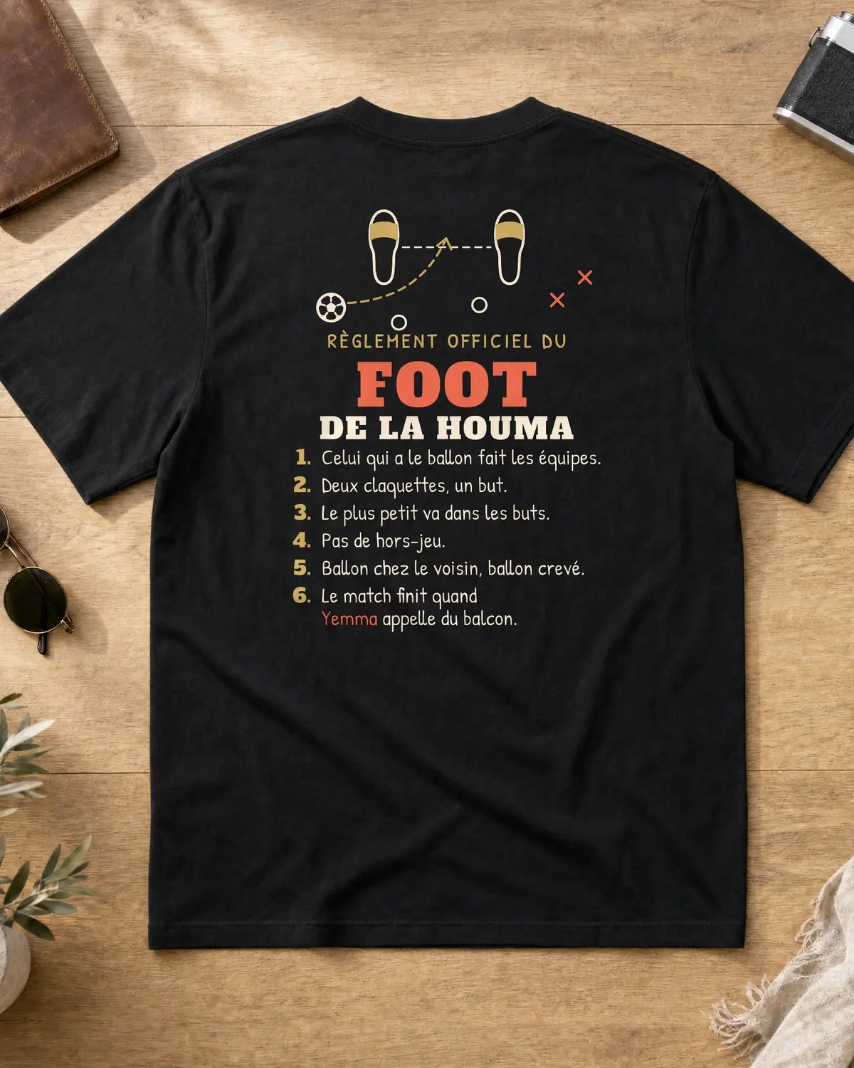Black t-shirt back with the Règlement officiel du foot de la houma and six rules